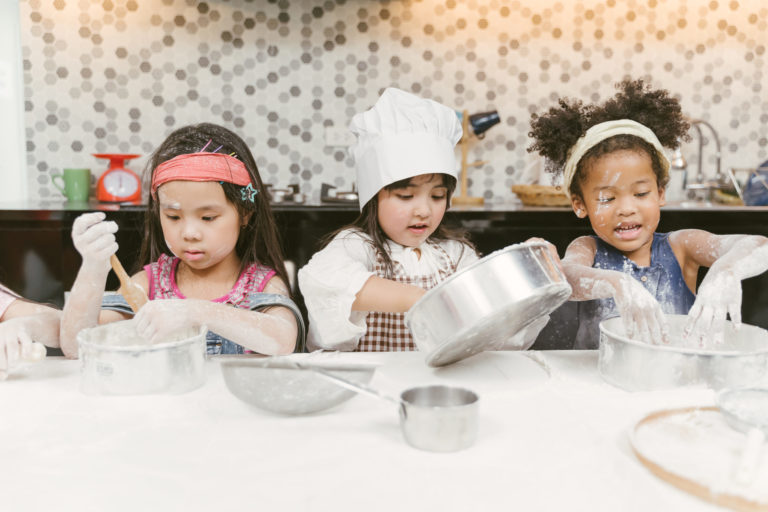 Group Of Kids Are Preparing The Bakery In The Kitchen Children